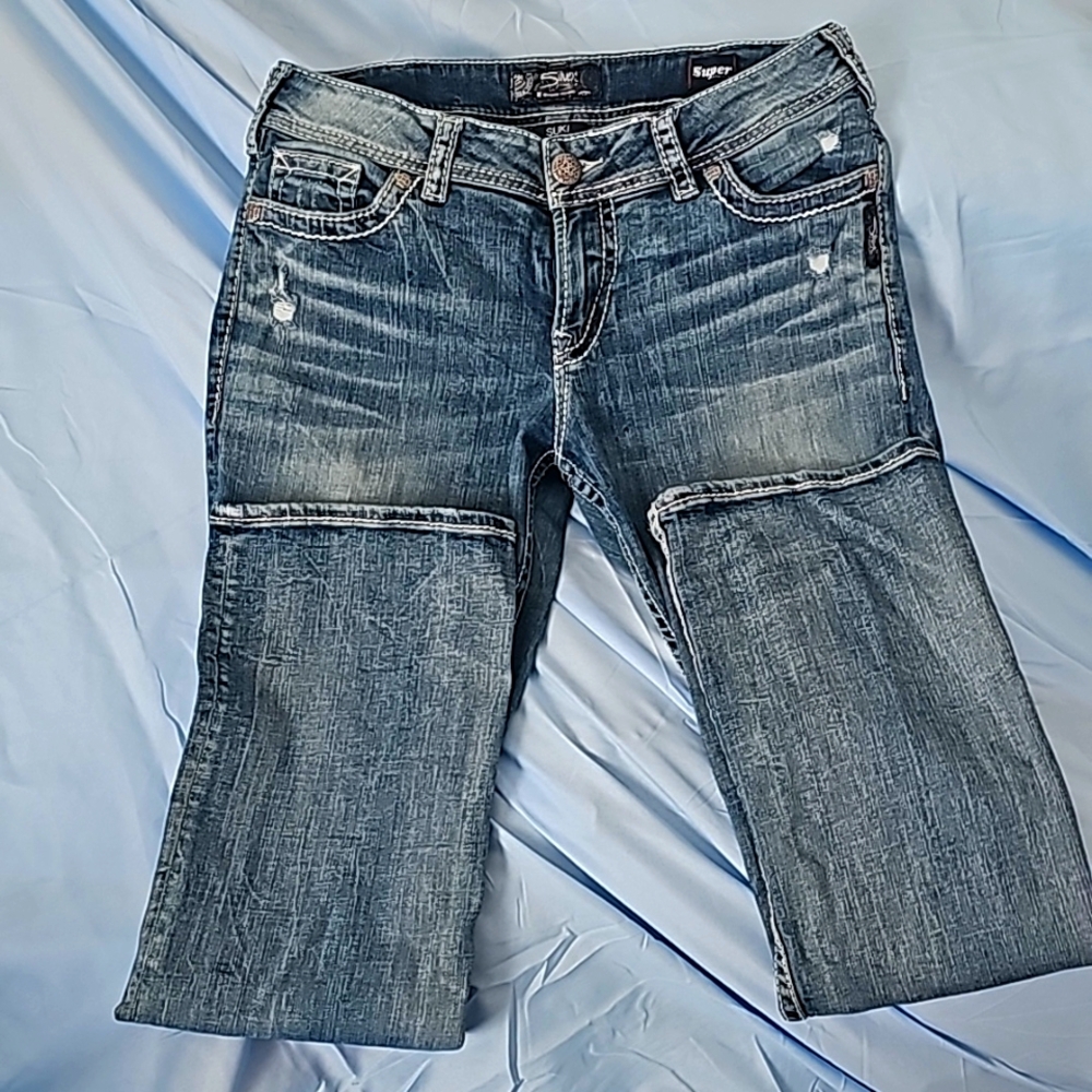 Silver boot cut jeans. Medium wash. Sz 31